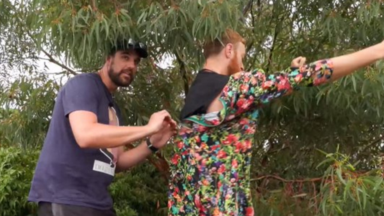 ‘Better not look suspicious – let’s lurk in the bushes while you zip me into this frock.’