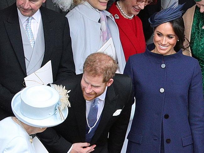 Prince Harry and Meghan Markle with the Queen at Princess Eugenie’s wedding to Jack Brooksbank. The couple went on a “date in disguise” with Eugenie and Brooksbank. Picture: AFP