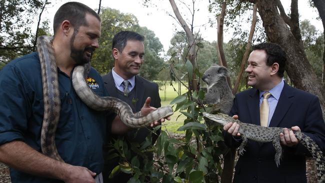 The CEOs of Sydney Zoo, Jake Burgess and Muru Mittigar, Peter Chia with Penrith MP Stuart Ayres meeting animals at the launch of a Sydney Zoo/Muru Mittigar partnership to bring Aboriginal cultural experiences to visitors to the new zoo at Bungarribee Super Park. Picture: David Swift