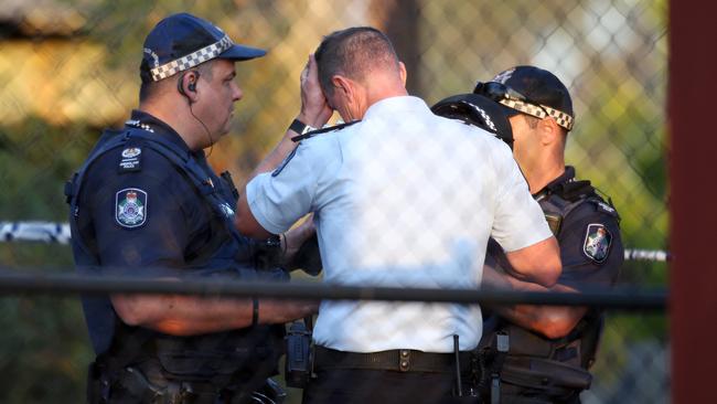 Police officers at Dreamworld. Picture: NIGEL HALLETT