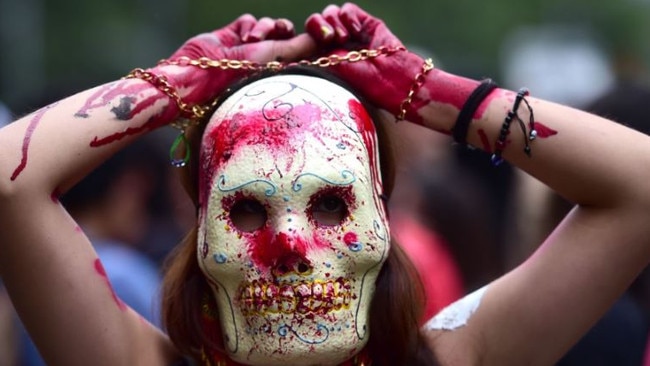 Students and relatives of the 43 missing students from Ayotzinapa take part during a protest in Mexico city, on September 26, 2015, to commemorate the first anniversary of their disappearance. The students, from a rural teachers school in the southern state of Guerrero, disappeared after they were attacked by local police in the city of Iguala on September 26, 2014