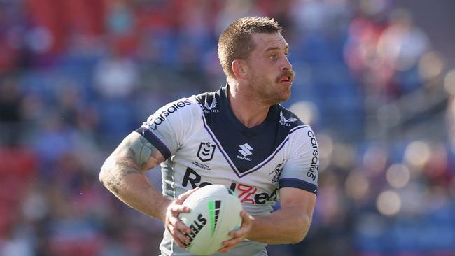 NEWCASTLE, AUSTRALIA - MAY 01: Cameron Munster of the Storm in action during the round eight NRL match between the Newcastle Knights and the Melbourne Storm at McDonald Jones Stadium, on May 01, 2022, in Newcastle, Australia. (Photo by Ashley Feder/Getty Images)