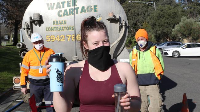 Sharni Wright fills up at the tanker in Ferntree Gully. Picture: David Crosling