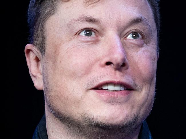 (FILES) In this file photo Elon Musk, founder of SpaceX, speaks during the Satellite 2020 at the Washington Convention Center on March 9, 2020, in Washington, DC. - Tesla began officially accepting bitcoin as currency to purchase electric autos, Chief Executive Elon Musk said on March 24, 2021 a with bitcoin,