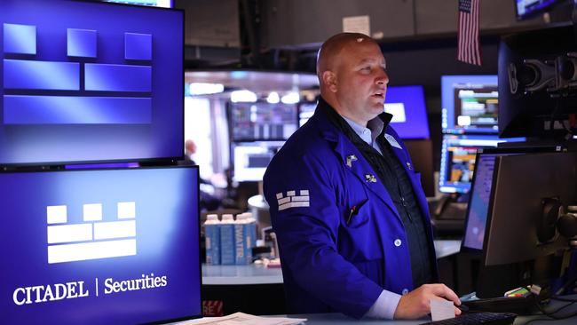 Traders work on the floor of the New York Stock Exchange. Picture: AFP