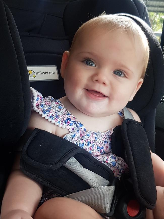 Faith Amitrano was all smiles for a car ride with mummy. Picture: Danielle Auton