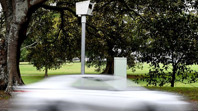 SYDNEY, AUSTRALIA - NewsWire Photos NOVEMBER 30, 2021: Motorists drive past a fixed speed camera as concerns the NSW government's decision to remove warning signs from mobile speed cameras  was a revenue raising exercise.Picture: NCA NewsWire / Jeremy Piper