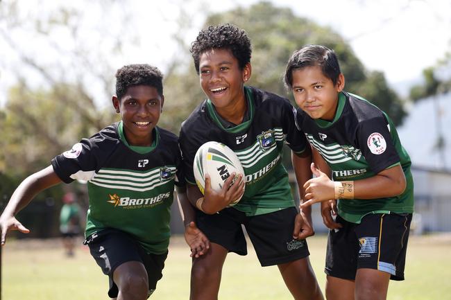 Former Cairns West Primary School students Wallace Charlie, Davidson Benioni and Taakoi Benioni.