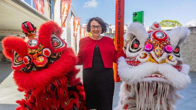 Cumberland Mayor Lisa Lake prepares to watch lion dancers.