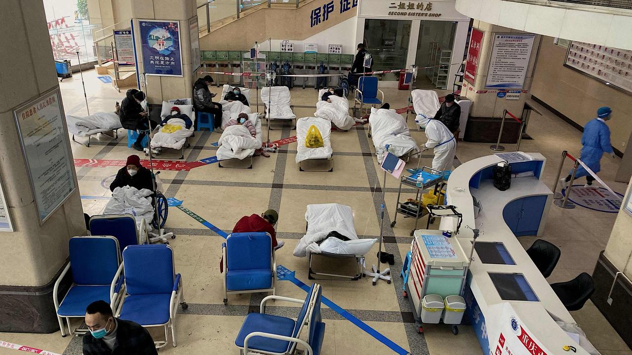 Covid-19 patients wait in the foyer area of a hospital in Chongqing, China. Picture: Noel Celis/AFP