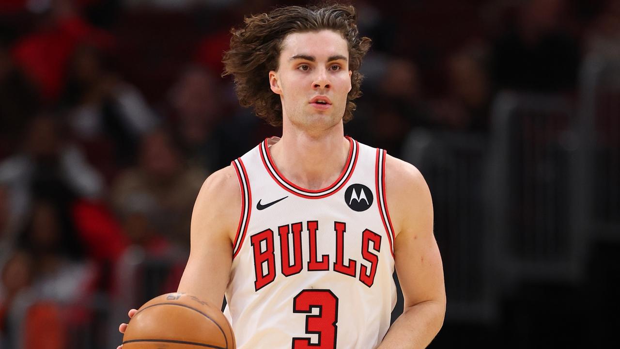 CHICAGO, ILLINOIS - OCTOBER 16: Josh Giddey #3 of the Chicago Bulls dribbles up the court against the Minnesota Timberwolves during the first half of a preseason game at the United Center on October 16, 2024 in Chicago, Illinois. NOTE TO USER: User expressly acknowledges and agrees that, by downloading and or using this photograph, User is consenting to the terms and conditions of the Getty Images License Agreement. (Photo by Michael Reaves/Getty Images)