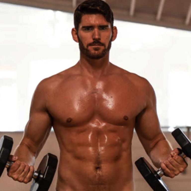 Erik sweating it in the gym. Picture: Supplied/BodyAndSoul