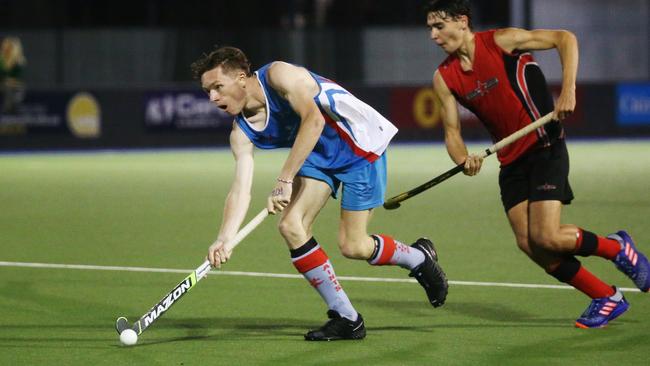 South Cairns beat the Cairns Saint in the Cairns Hockey A Grade Men's grand final match on Saturday night. Saints' Brodie Quirk takes control. PICTURE: BRENDAN RADKE.