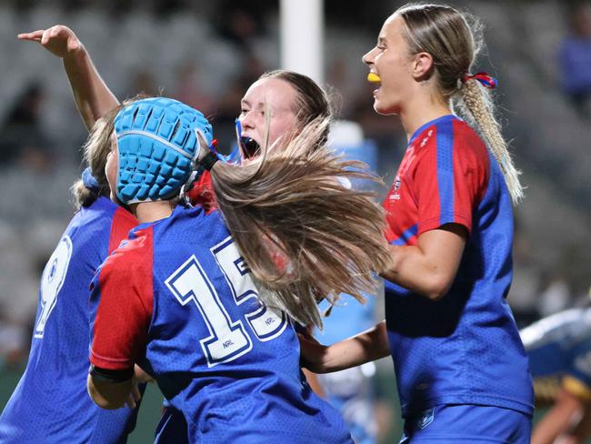 SUNDAY TELEGRAPH, APRIL 23, 2022: Knights players celebrate after a try in the 2nd half. Tarsha Gale Cup: Parramatta Eels v Newcastle Knights, Kogarah.Picture: Damian Shaw