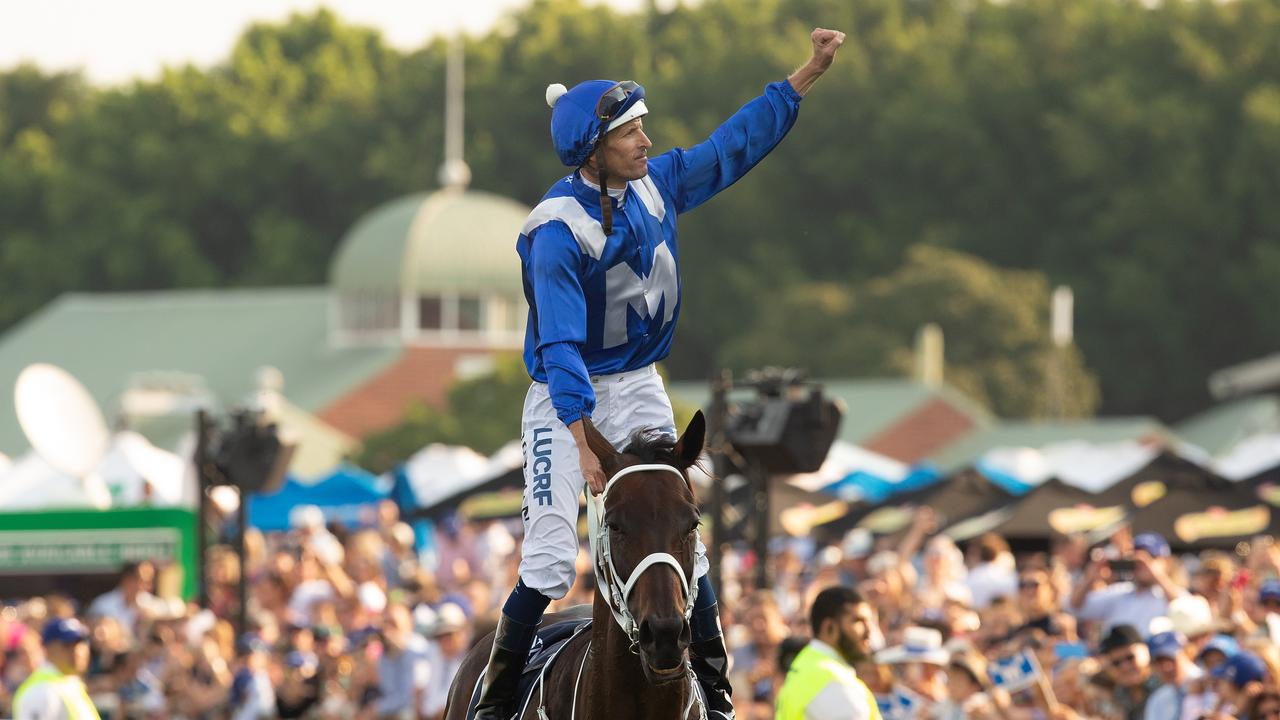 Winx and jockey Hugh Bowman after her final victory at Randwick on Saturday.