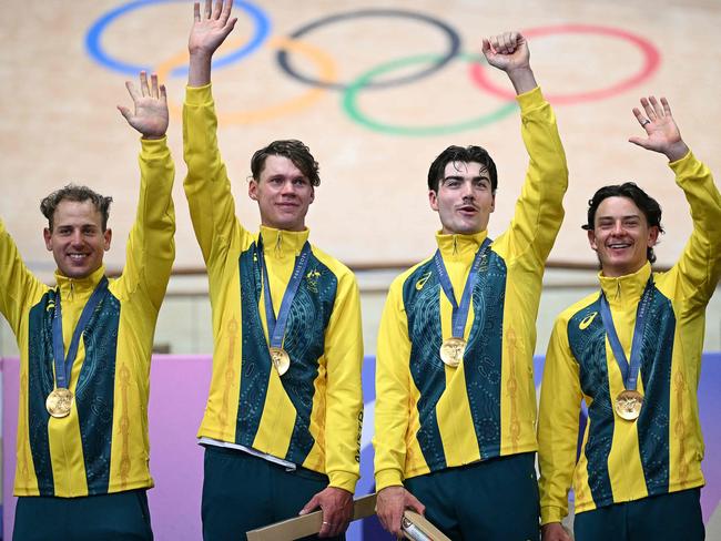 Sam Welsford, Kelland O'brien, Conor Leahy and Oliver Bleddyn celebrate on the podium. Picture: AFP