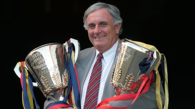 Hammond with Adelaide’s two premiership cups...