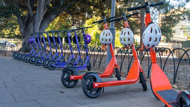 Beam and Neuron e-scooters parked in the CBD.​