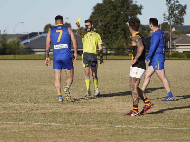 Cranbourne’s Marc Holt is given a yellow card by the umpire on Saturday. Picture: Valeriu Campan
