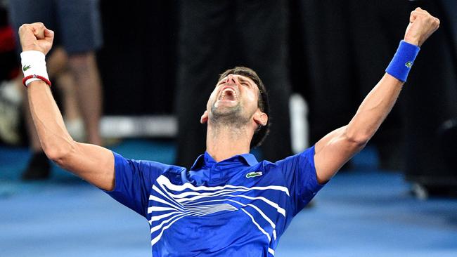 Novak Djokovic celebrates after winning the Australian Open in 2019. Picture: AFP