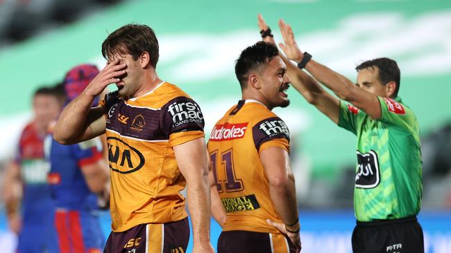 Patrick Carrigan has been hit with a grade two dangerous contact charge for his late tackle on Knights halfback Mitchell Pearce. Picture: Cameron Spencer/Getty Images