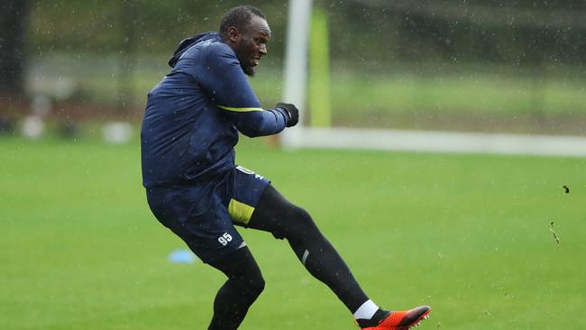 Usain Bolt training with the Mariners last month. Picture: Brett Costello