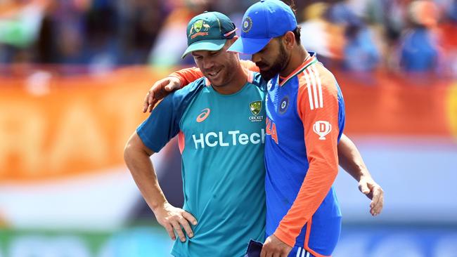 David Warner and Virat Kohli embrace after what could be Warner’s final international. Picture: Gareth Copley/Getty Images