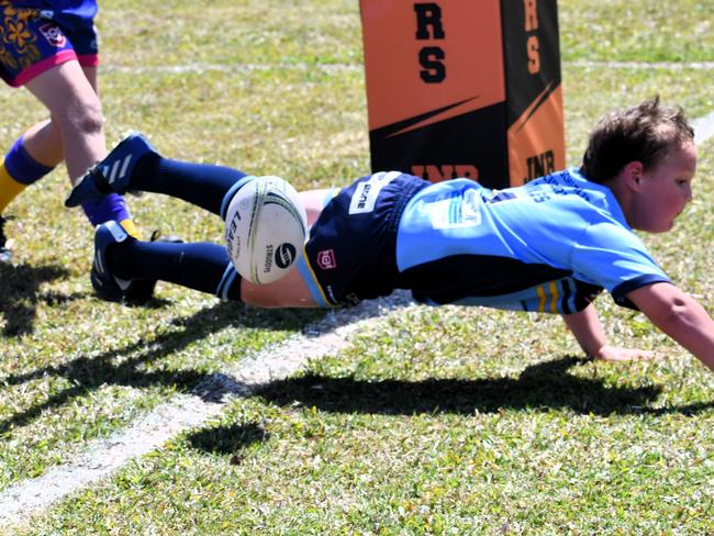 An under 8’s rugby league player drops the ball over the line as he attempts to score a try. Picture: Cameron Bates