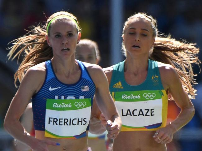 USA's Courtney Frerichs (L) and Australia's Genevieve Lacaze compete in the Women's 3000m Steeplechase Round 1 during the athletics event at the Rio 2016 Olympic Games at the Olympic Stadium in Rio de Janeiro on August 13, 2016. / AFP PHOTO / OLIVIER MORIN