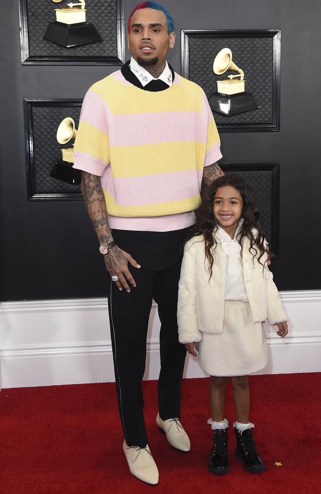 Chris Brown, left, and his daughter Royalty Brown. Picture: AP