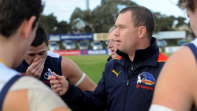 Adelaide coach Heath Younie talks to his players. Picture: Keryn Stevens