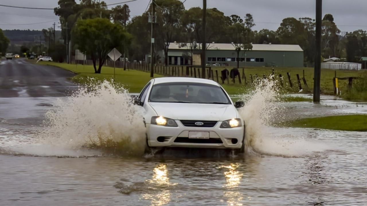 Up to 80mm of rain in Kingaroy, flooding streets and school The