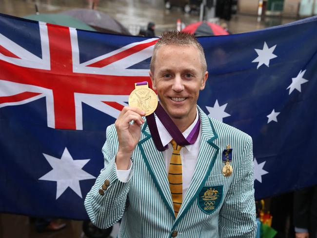 Jared Tallent's Gold Medal Presentation on the steps of Treasury buildings  Picture: Alex Coppel.