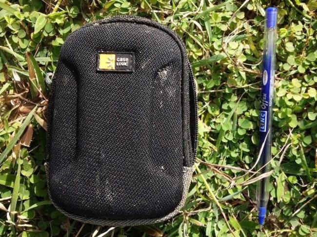 One of the 20 personal items found near suspected MH370 wreckage in Madagascar is this Case Logic brand mobile phone case Picture: Blaine A Gibson