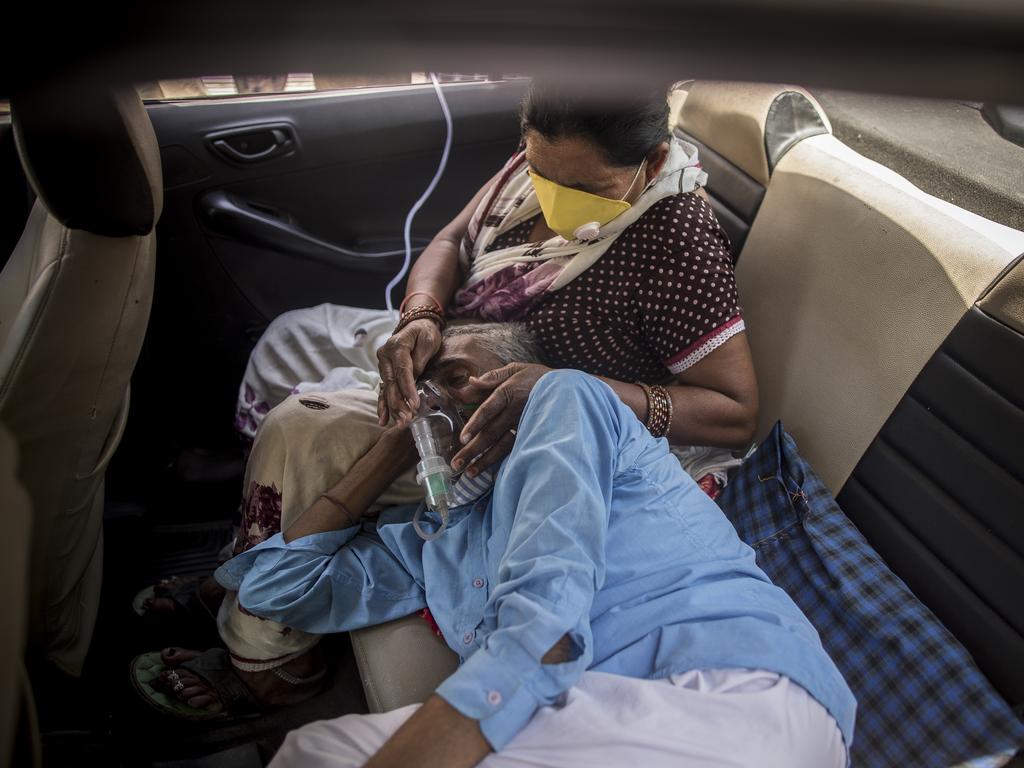 Patients with COVID-19 receive free oxygen from a Gurdwara or Sikh holy place as supplies run short in New Delhi. Picture: Anindito Mukherjee/Getty Images