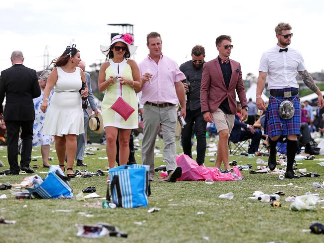 Melbourne Cup Day 2014 at Flemington Racecourse. Punters head home after the race. Picture: Mark Stewart