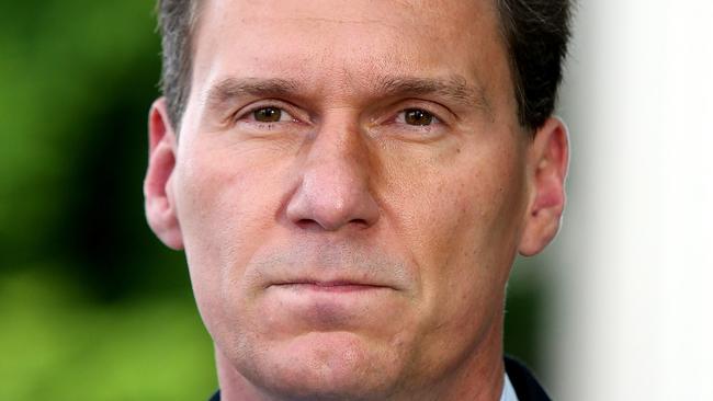 Senator Cory Bernardi speaking at Senate doors at Parliament House in Canberra.