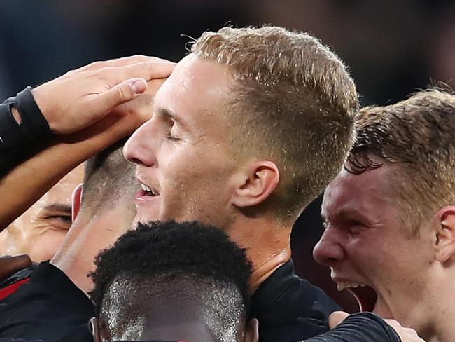SYDNEY, AUSTRALIA - OCTOBER 12: Mitchell Duke of the Wanderers celebrates scoring a goal with team mates during the round one A-League match between the Western Sydney Wanderers and the Central Coast Mariners at Bankwest Stadium on October 12, 2019 in Sydney, Australia. (Photo by Brendon Thorne/Getty Images)
