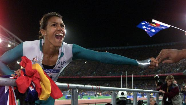Cathy Freeman celebrates her win in the women’s 400m final at the 2000 Sydney Olympics. Pic Craig Borrow.