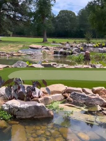 Putting and chipping greens surround the water.