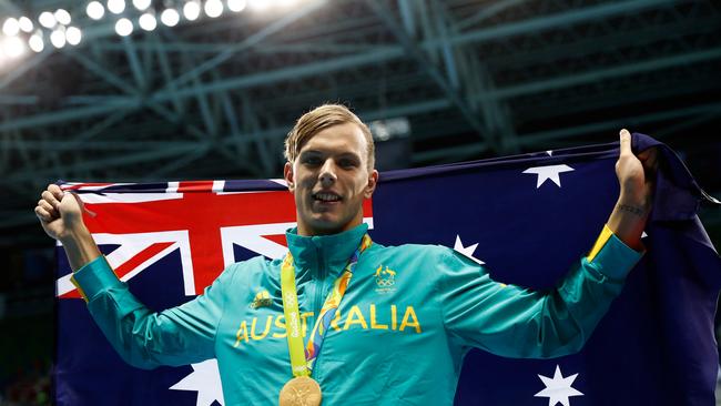 Kyle Chalmers with his gold medal after winning the 100m freestyle.