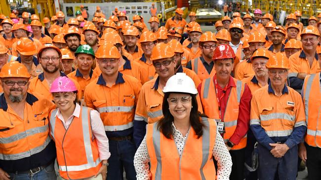 Queensland Premier Annastacia Palaszczuk with workers at the Downer EDI Rail manufacturing plant in Maryborough. Picture: AAP Image / Darren England.