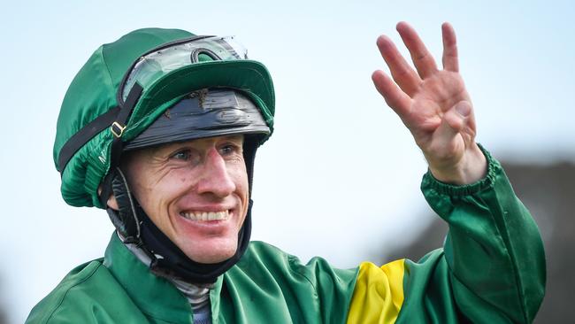 Willie Pike returns to the mounting yard after winning the Caulfield Guineas on Ole Kirk, a day he rode four winners. Photo: Racing Photos