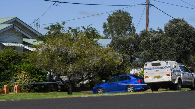 A crime scene remained in place at the Lismore home on Saturday morning.