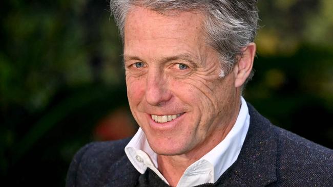 British actor Hugh Grant poses on the red carpet upon arrival to attend the world premiere of "Paddington In Peru" in London, on November 3, 2024. (Photo by JUSTIN TALLIS / AFP)