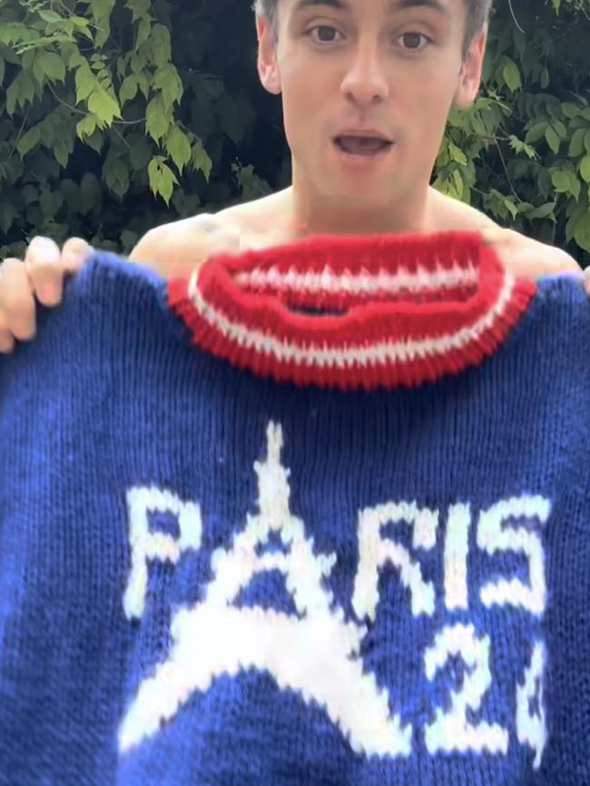 Tom Daley with the jumper he knitted