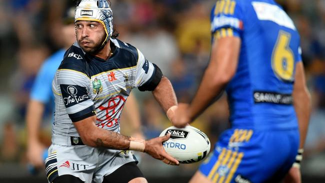 Johnathan Thurston in action against the Cowboys.