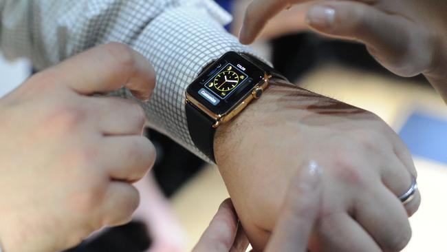 (FILES) This March 9, 2015 file shows an Apple employee demonstrating how to use an Apple Watch during an Apple media event at the Yerba Buena Center for the Arts in San Francisco, California. The Apple Watch is fueling the emerging smartwatch market and is expected to be the top seller in the segment for next few years, a market research report showed May 6, 2015. The IHS Technology report said the smartwatch market will grow to 101 million units by 2020 from just 3.6 million last year. AFP PHOTO / JOSH EDELSON