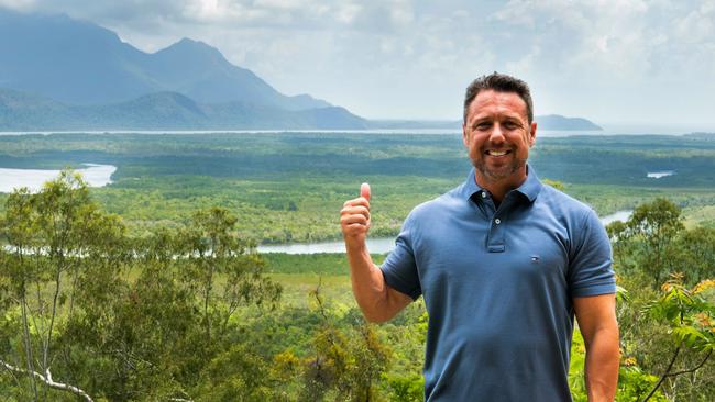 Member for Hinchinbrook Nick Dametto standing at the Cardwell Range Lookout with the Hinchinbrook Island National Park in the background. Picture: SUPPLIED