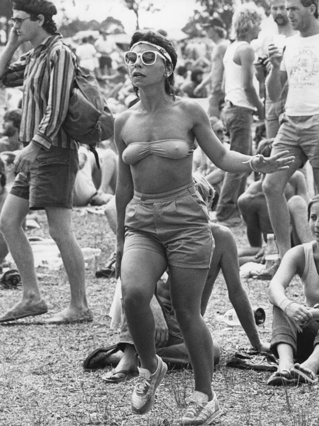 A fan dancing in the crowd during the Narara Rock Festival near Gosford in 1984. Picture: Charlie Steell.